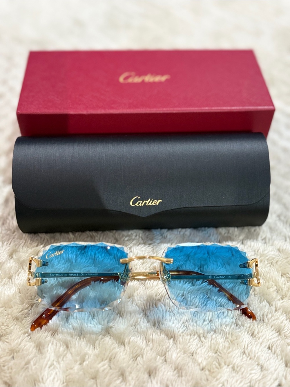 Cartier Rimless Sunglasses with Blue Lenses and Gold Hardware